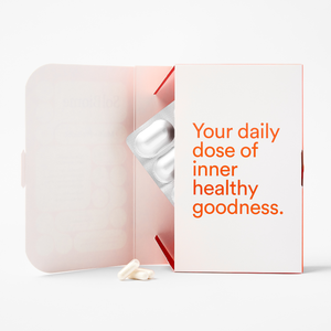 SolBiome Open Box with text 'Your daily dose of inner healthy goodness' on a light grey background with probiotic capsules.
